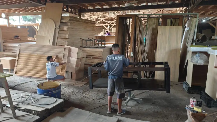 Inside Bali Best Buy workshop showing mass production of custom teak furniture