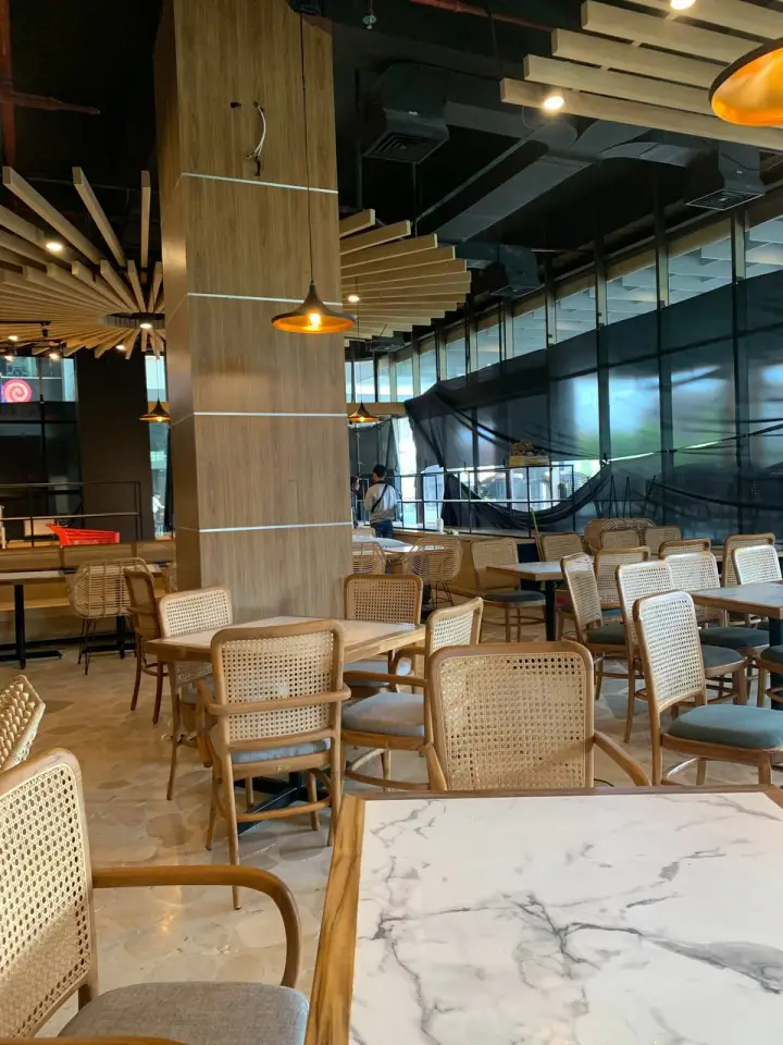 Custom restaurant tables and chairs at Goemerot Restaurant Trans Studio Mall Bali