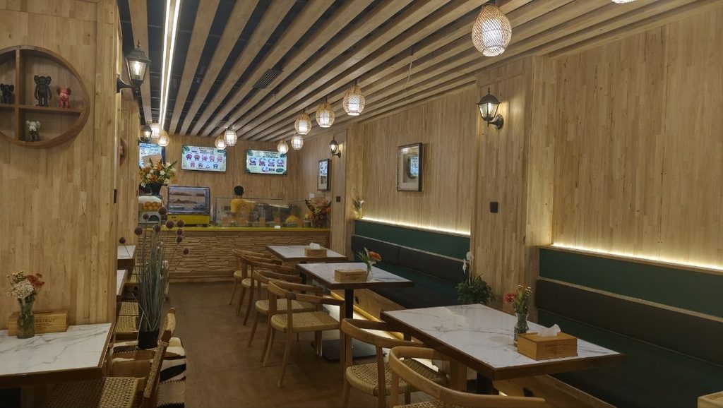 Made-to-order teak restaurant tables and chairs at Nasi Lemak Wak Teni Restaurant
