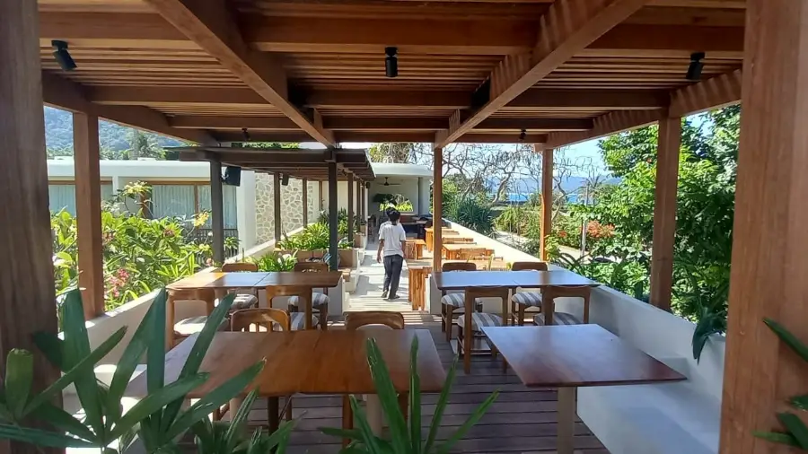 Custom teak dining tables and chairs for Boni Beach Restaurant in Selong Belanak, Lombok.